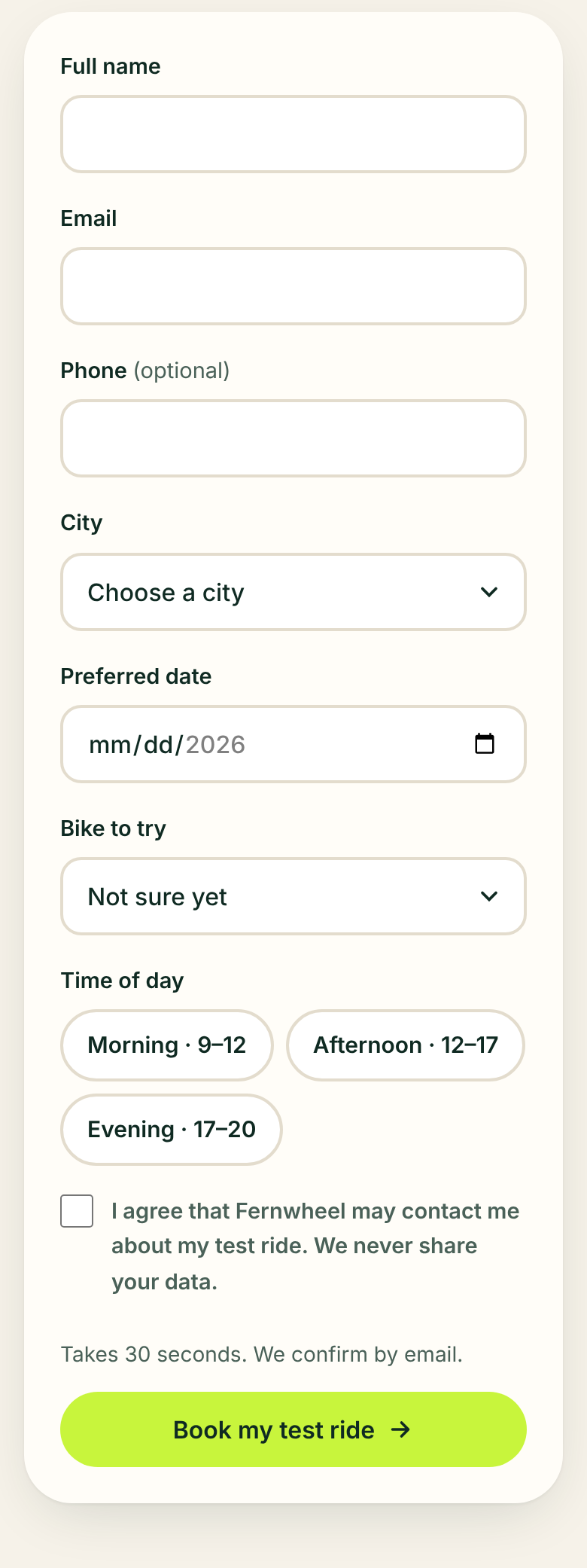 Exhibit A booking form on a phone: full name, email, phone, city, preferred date, bike, time of day and a consent checkbox, then a lime Book my test ride button.