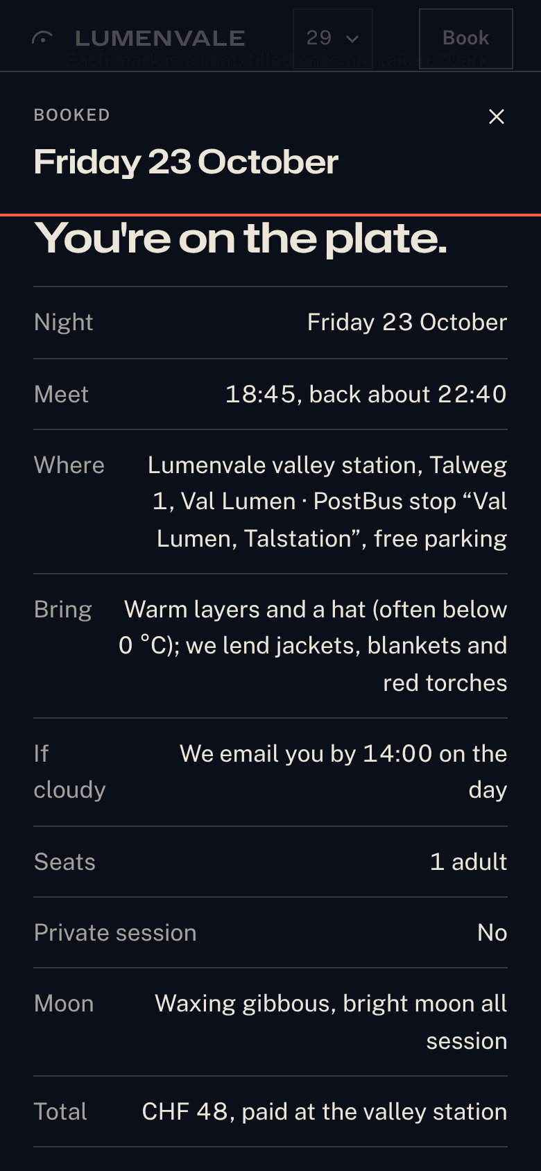 Exhibit B ticket on a phone: You're on the plate, with rows for night, meet time, where, what to bring, if cloudy, seats, private session, moon and total paid at the valley station.