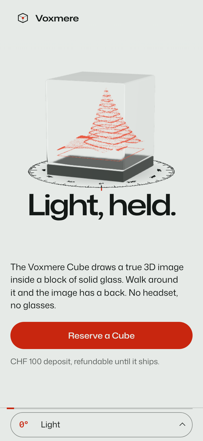 Exhibit B first phone screen: a clear glass cube on a degree ring with a red point-cloud peak inside, the headline Light, held. below it, one line of copy, one red Reserve a Cube button and the deposit terms.